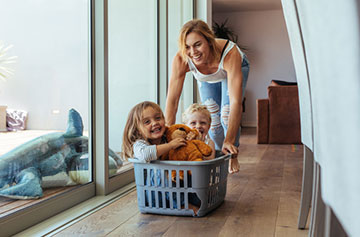 Mom and kids enjoying home after professional cleaning service
